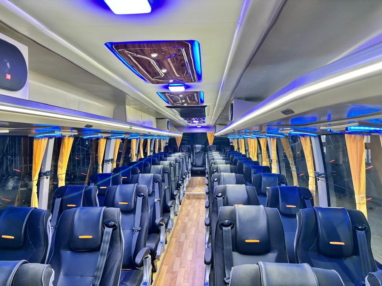 Luxury bus interior hire Delhi for India group trip