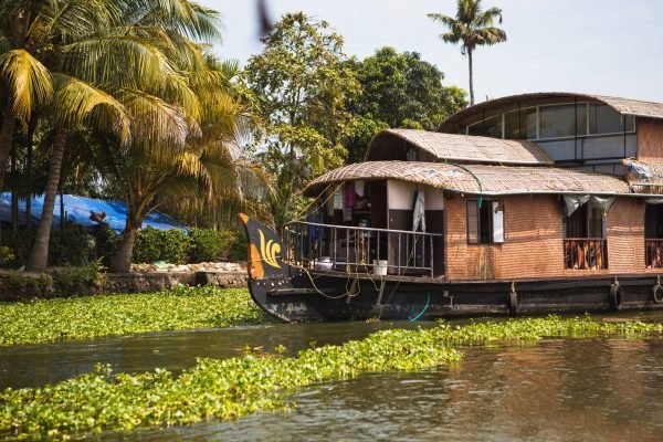 house boat pleasure cruise ship in india, kerala on the seaweed